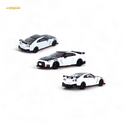 White Inno64 Nissan GT-R R35 NISMO diecast model, detailed 1:64 scale car with realistic features and branding.