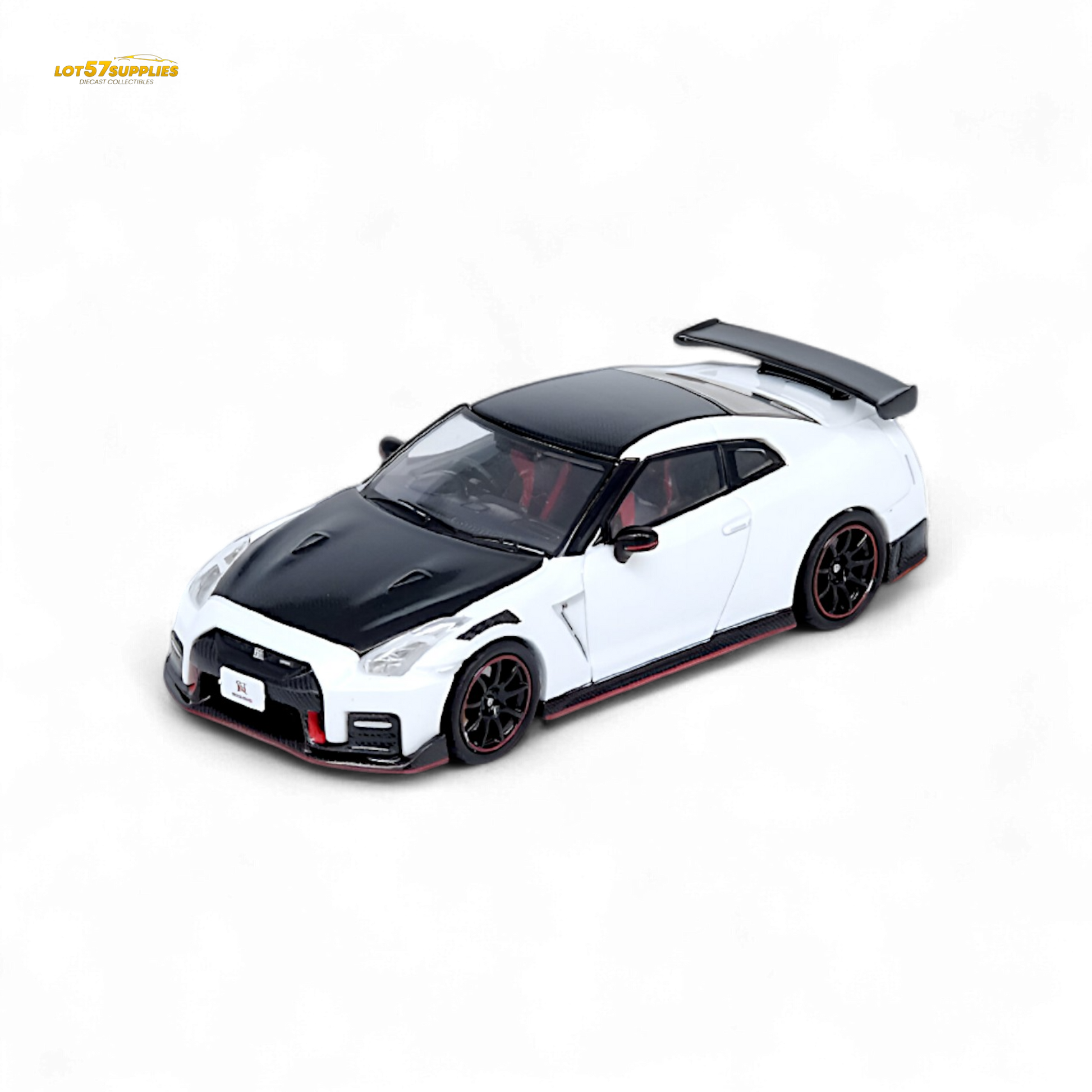 White Inno64 Nissan GT-R R35 NISMO diecast model, detailed 1:64 scale car showcasing sleek design and NISMO branding.