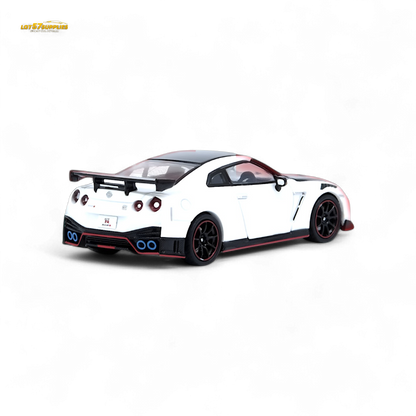 White Inno64 Nissan GT-R R35 NISMO diecast model in 1:64 scale, detailed view of the Nissan sports car.