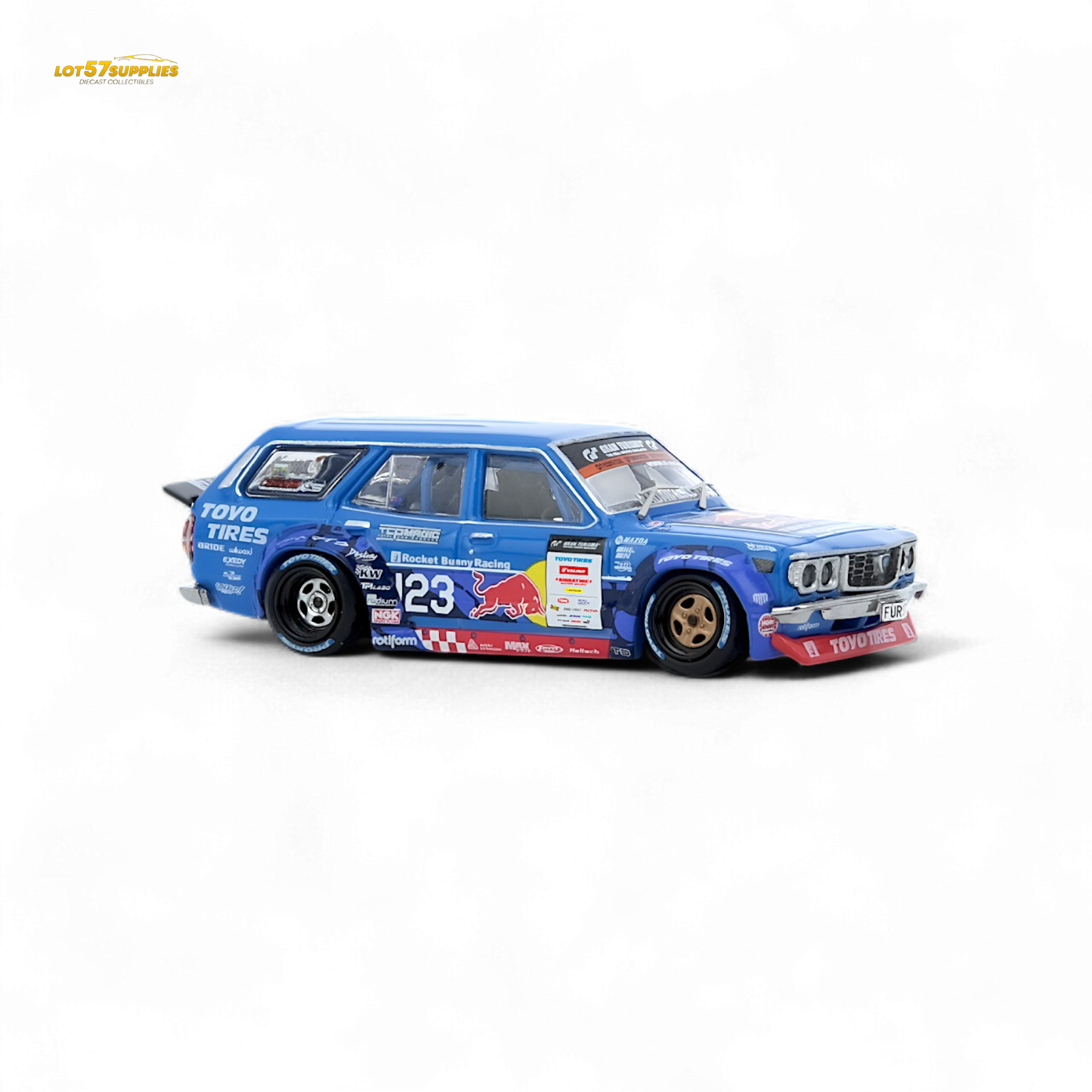 Detailed diecast model of a Mazda RX3 Station Wagon in 1:64 scale by Lot57Supplies Diecast Shop, shown from a side angle.
