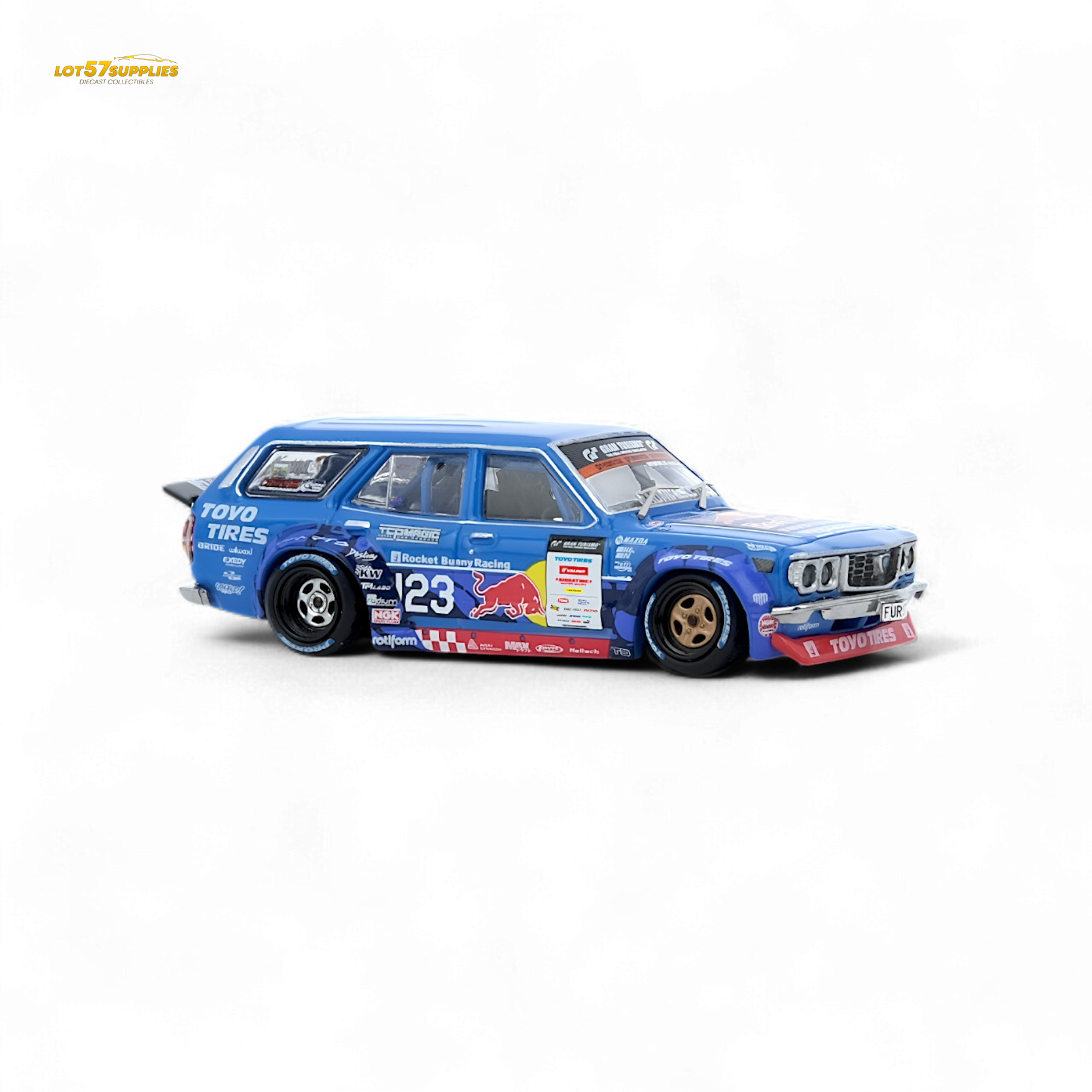 Detailed diecast model of a Mazda RX3 Station Wagon in 1:64 scale by Lot57Supplies Diecast Shop, shown from a side angle.