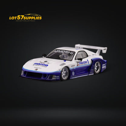 Blue and white Inno64 Mazda RX-7 LBWK FD3S diecast model in 1:64 scale, detailed view showing aerodynamic design and branding.