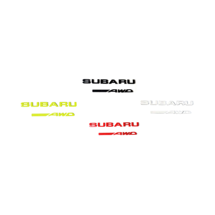 Racing Art Subaru symmetrical AWD trunk emblem in black, red, neon yellow, and white for WRX, STI, Forester, Crosstrek vehicles.