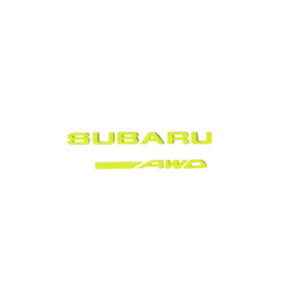 Racing Art Subaru symmetrical AWD trunk emblem in black, red, neon yellow, and white for WRX, STI, Forester, Crosstrek.