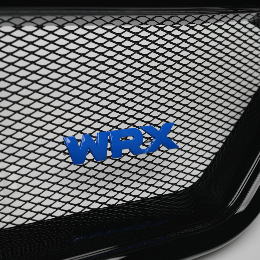 Racing Art WRX grille emblem by JDMuscle with multiple color options, designed for 2008-2014 Subaru WRX vehicle grille.