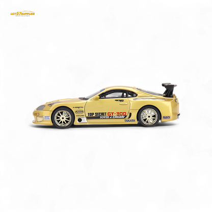 Mini-GT Toyota Supra A80 Top Secret diecast model in gold, detailed 1:64 scale car featuring sleek design and realistic features.
