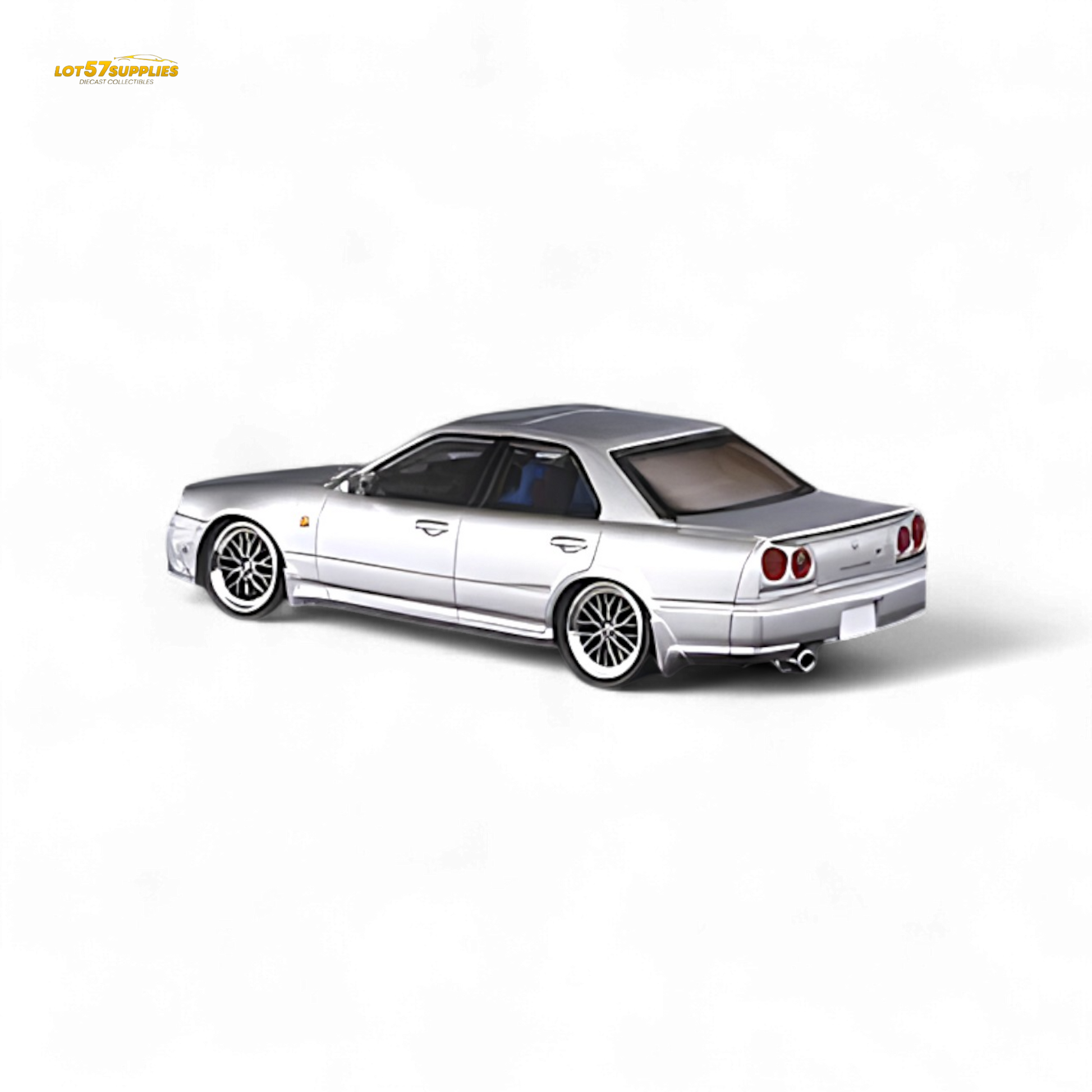 Silver Nissan Skyline 25GT-t diecast model in 1:64 scale by Lot57Supplies Diecast Shop, detailed miniature car on display.
