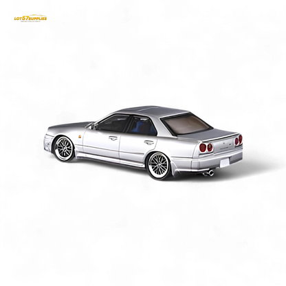 Silver Nissan Skyline 25GT-t diecast model in 1:64 scale by Lot57Supplies Diecast Shop, detailed miniature car on display.