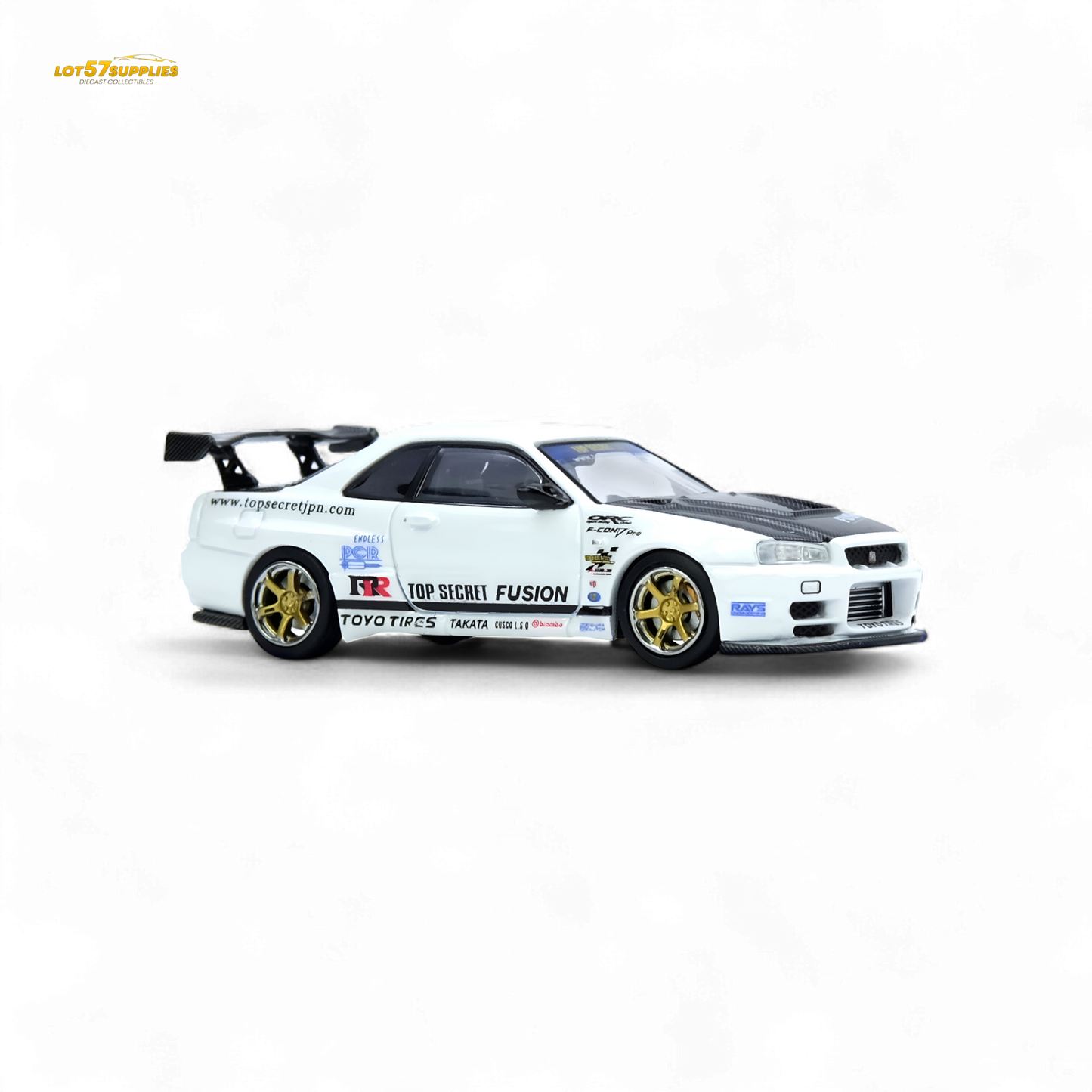 White Inno64 Top Secret R34 GT-R diecast car, 1:64 scale Nissan model with detailed exterior, on a plain background