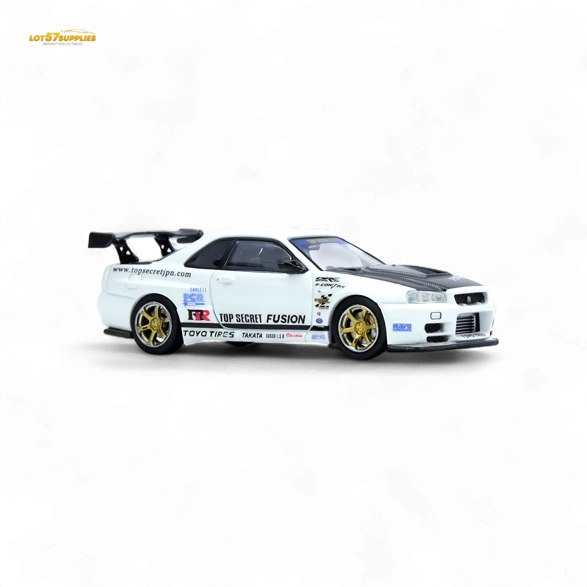 White Inno64 Top Secret R34 GT-R diecast car, 1:64 scale Nissan model with detailed exterior, on a plain background