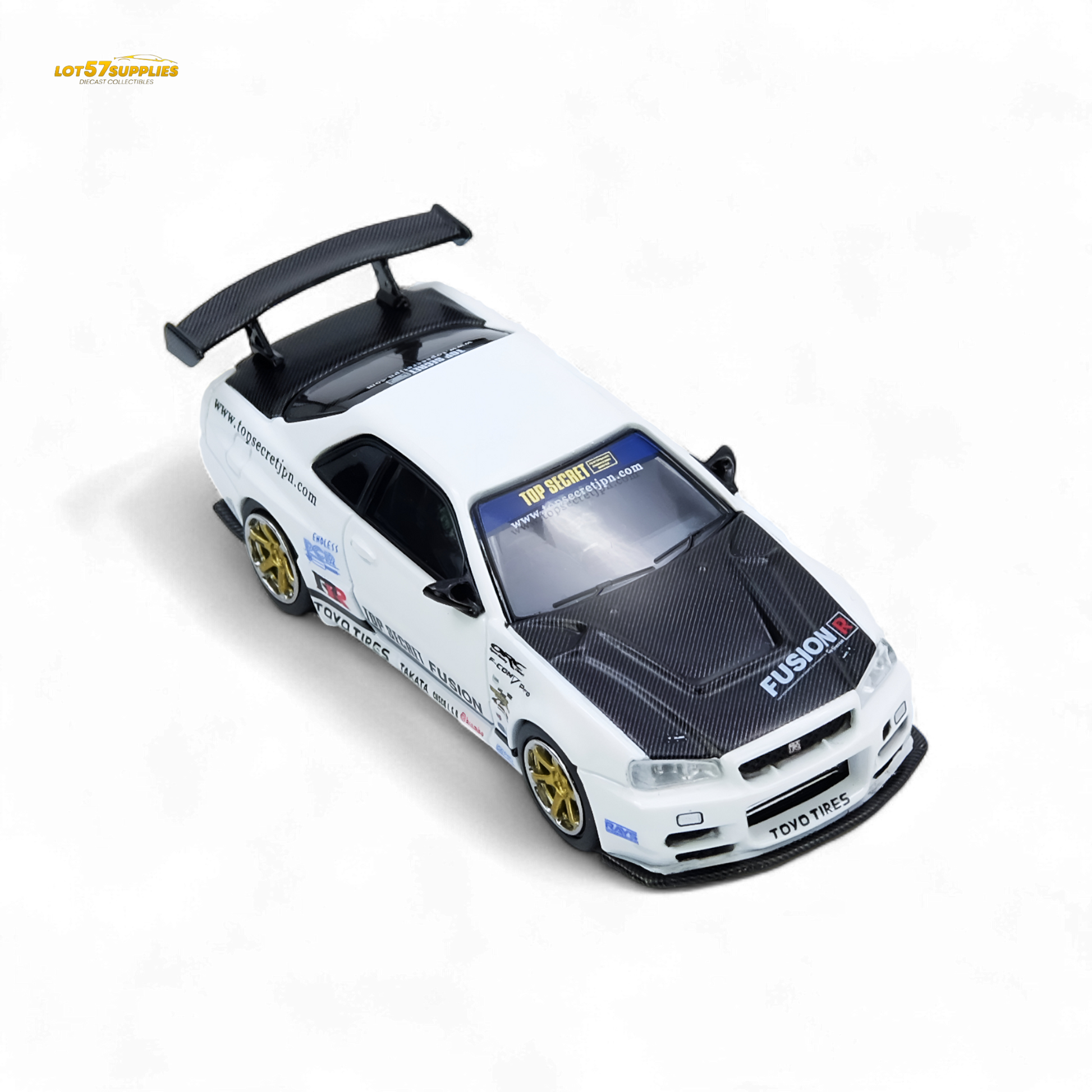 White Inno64 Nissan R34 GT-R diecast model in 1:64 scale, detailed with top secret R34 design elements.