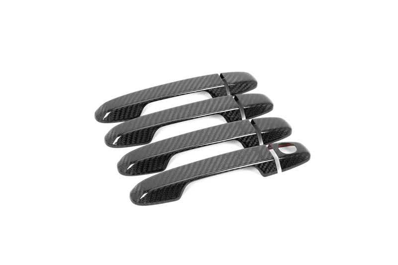 OLM carbon fiber door handle covers for 2022 WRX base and premium trim, exterior car door handle upgrade with sleek carbon fiber finish.