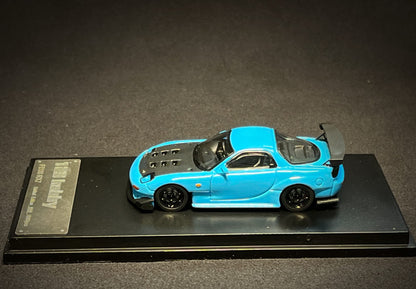 Baby blue Mazda FD3S RX-7 diecast model in 1:64 scale by Lot57Supplies Diecast Shop, detailed miniature car for collectors.