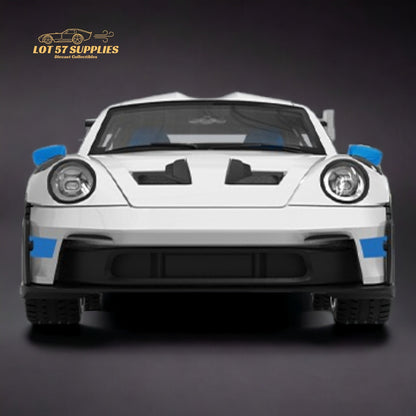 White and blue wheels on a 1:64 scale Porsche 911 GT3 RS diecast model by Lot57Supplies.