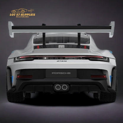 White and blue Porsche 911 GT3 RS diecast model with detailed wheels, 1:64 scale, featuring realistic design and vibrant colors.