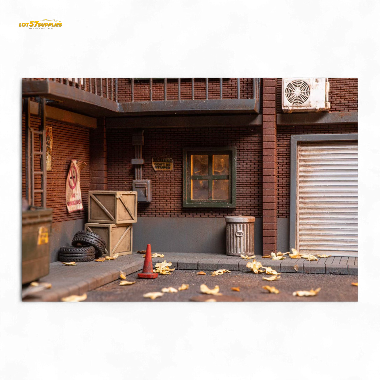 Detailed 1:64 scale Liberty 64 building diorama by Lot57Supplies Diecast Shop, featuring miniature urban scene with buildings and accessories.