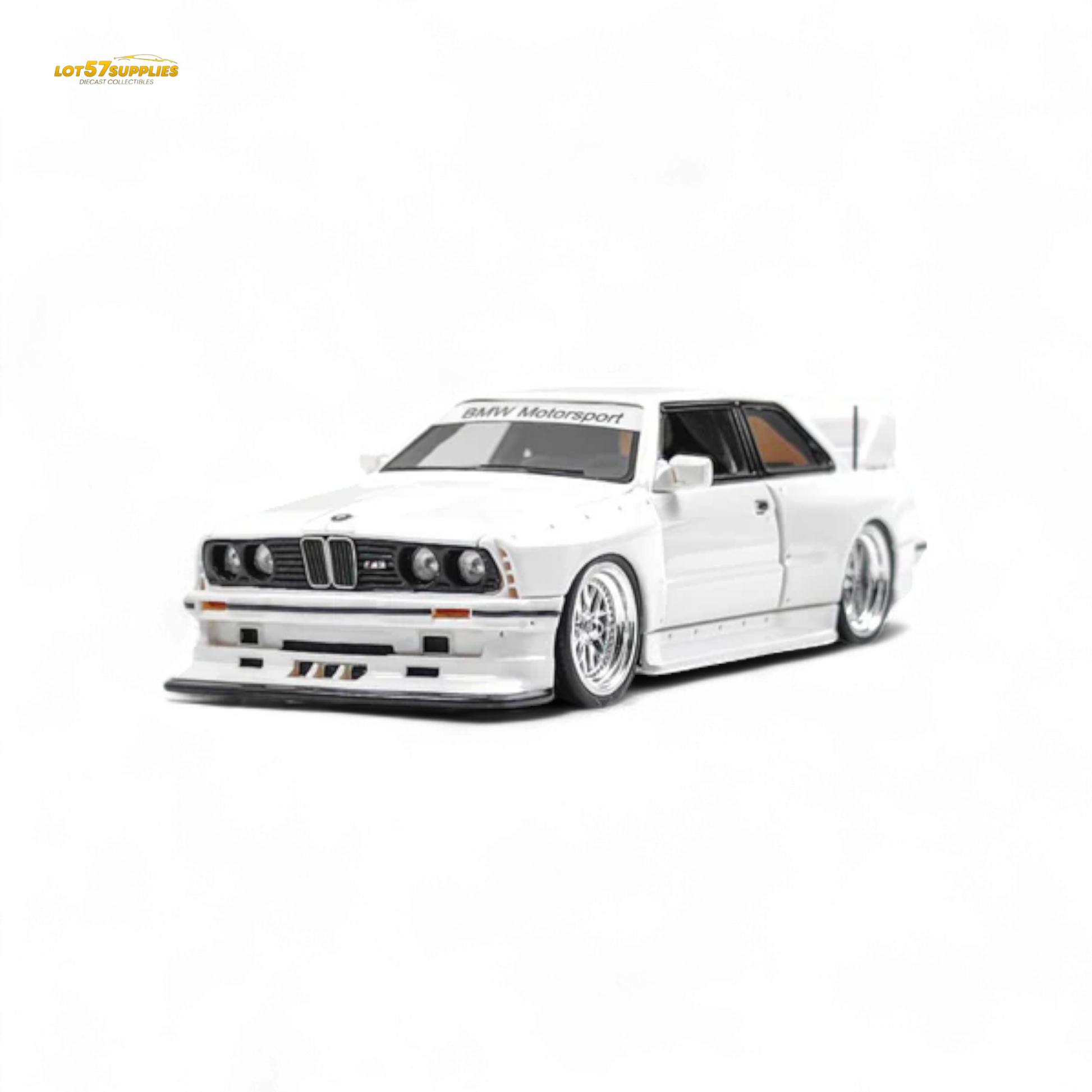 White BMW E30 1:64 scale diecast model with wide-body design from Lot57Supplies Diecast Shop, detailed and collectible.