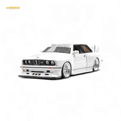 White BMW E30 1:64 scale diecast model with wide-body design from Lot57Supplies Diecast Shop, detailed and collectible.