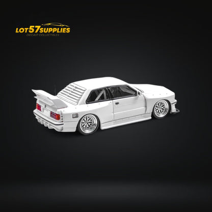 White BMW E30 wide-body diecast model in 1:64 scale by Lot57Supplies Diecast Shop, detailed view of the miniature car.