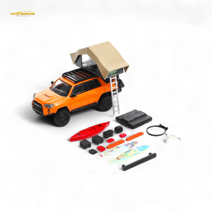Orange modified 1:64 scale Toyota 4 Runner diecast model by Lot57Supplies Diecast Shop, detailed view of the miniature vehicle.