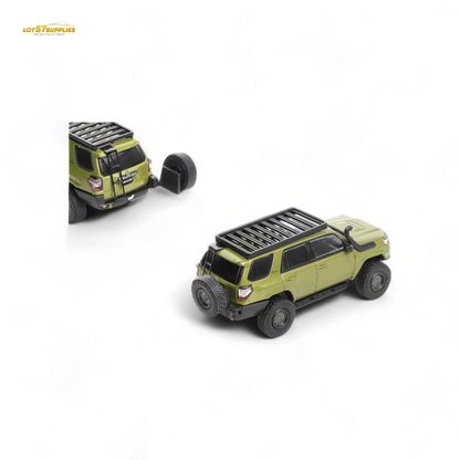 Olive green 1:64 scale GCD Toyota 4 Runner diecast model, detailed modified version with realistic features and branding.