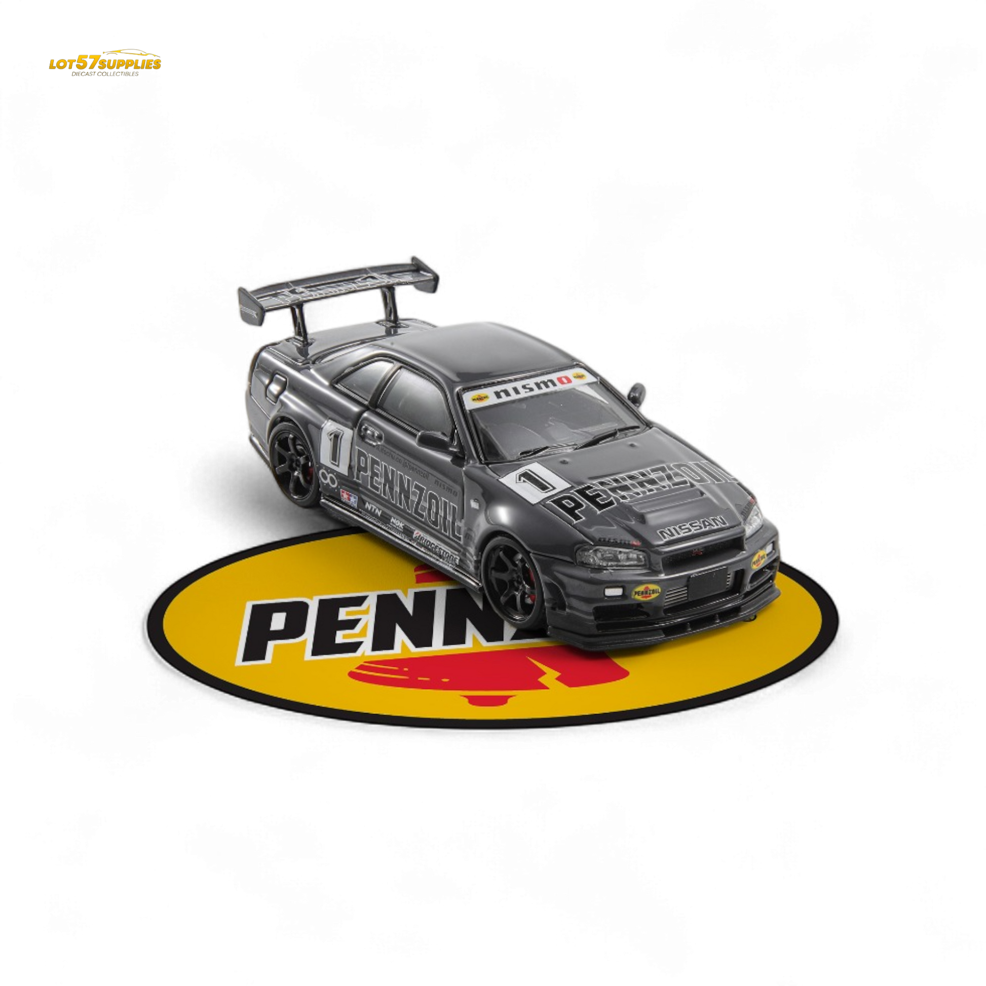 Gray Nissan Skyline GT-R R34 Nismo Z-Tune 1:64 diecast model featuring detailed design and branding.
