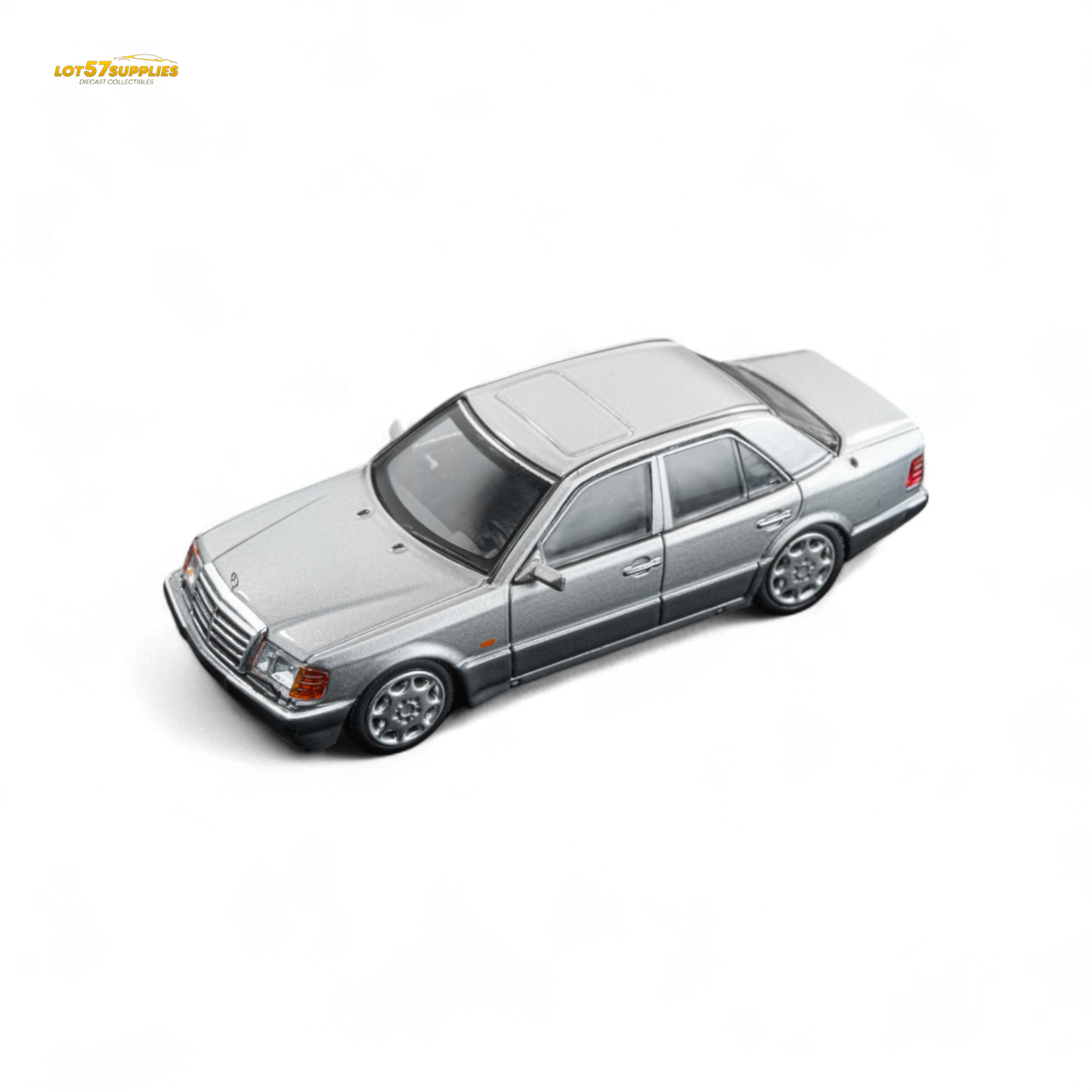 Gray titanium Mercedes-Benz 500E diecast model in 1:64 scale by DCM Benz, detailed silver finish, new pre-order item.