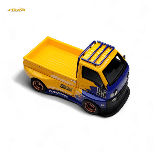 Detailed 1:64 scale Suzuki Carry D12 Widebody diecast model in black, showcasing realistic design and widebody features.