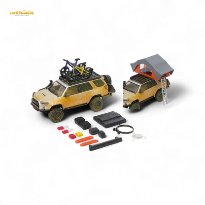 Silver GCD Toyota 4Runner diecast model in 1:64 scale, featuring muddy detailing, from Lot57Supplies Diecast Shop.