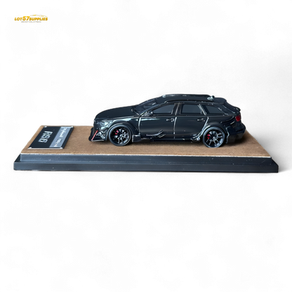 Black Qidian model Audi RS6 Avant (C7) wide-body diecast car in 1:64 scale, detailed miniature with modified design.