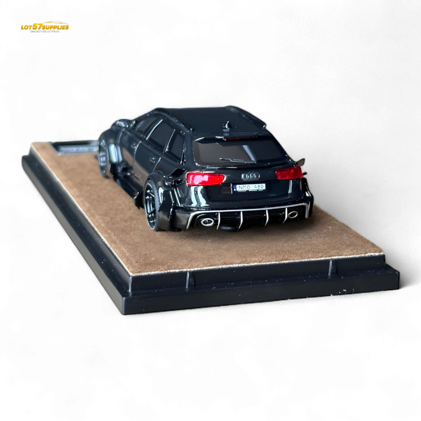 Black Qidian model Audi RS6 Avant (C7) wide-body diecast car in 1:64 scale, detailed with modified exterior features.