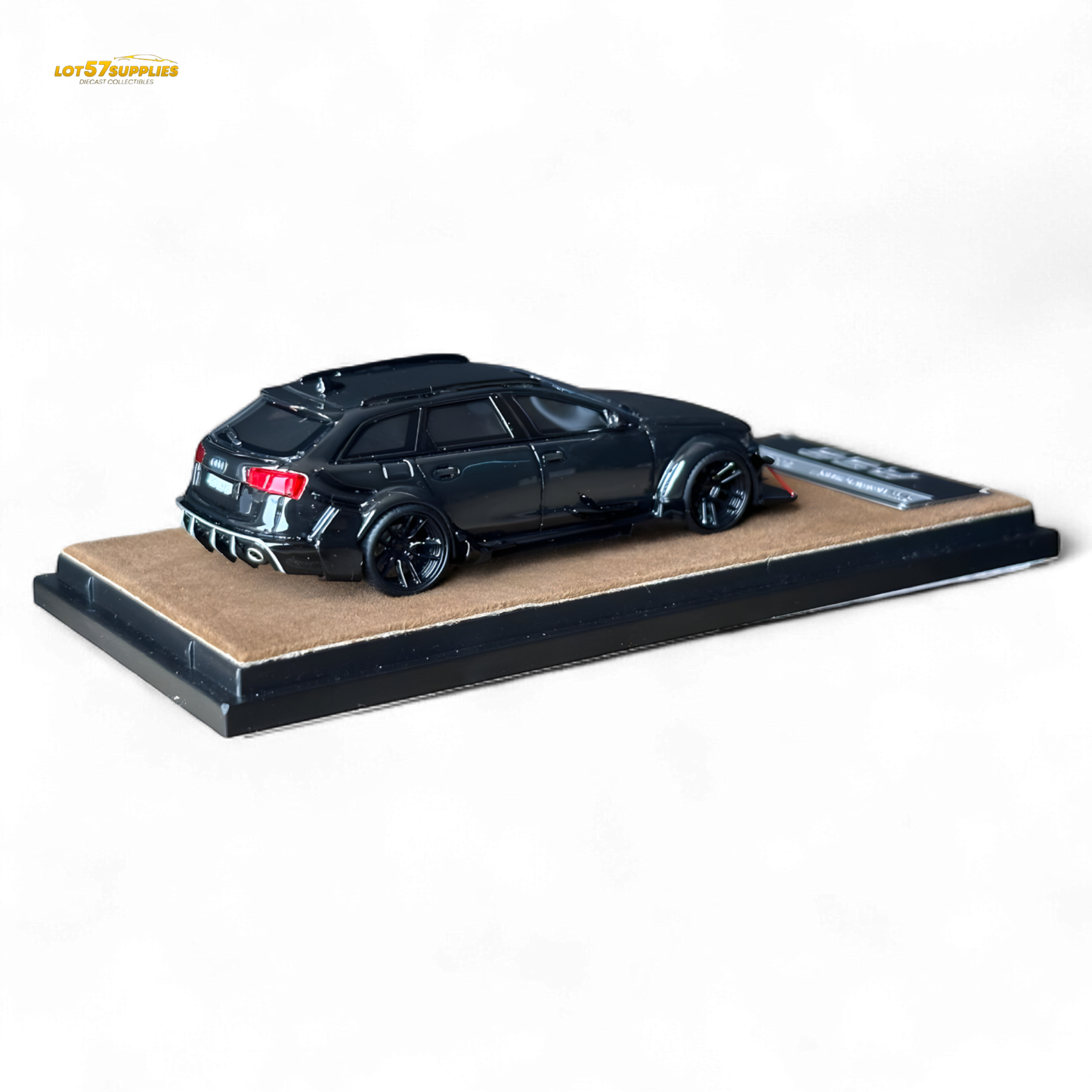 Black Qidian model Audi RS6 Avant (C7) wide-body diecast car, 1:64 scale, featuring detailed modifications and realistic design.