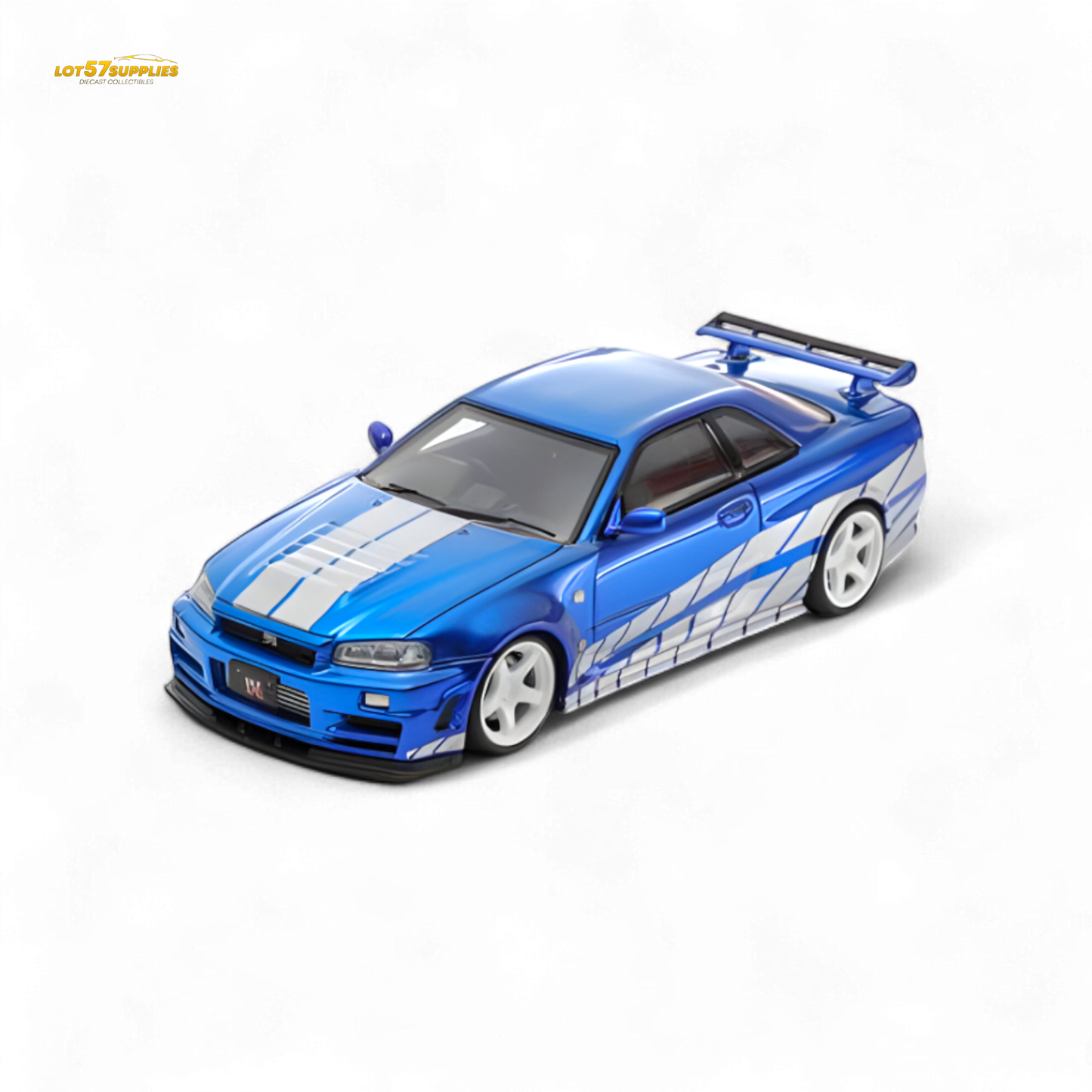 Blue Nissan Skyline GT-R R34 Nismo Z-Tune diecast model in 1:64 scale, showcasing detailed design and vibrant color.