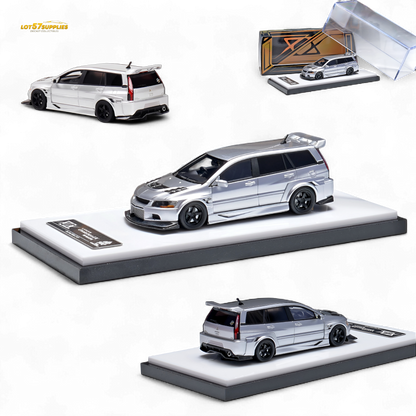 Glossy silver Mitsubishi Lancer EVO 9 wagon diecast model in 1:64 scale, detailed miniature from Lot57Supplies Diecast Shop.