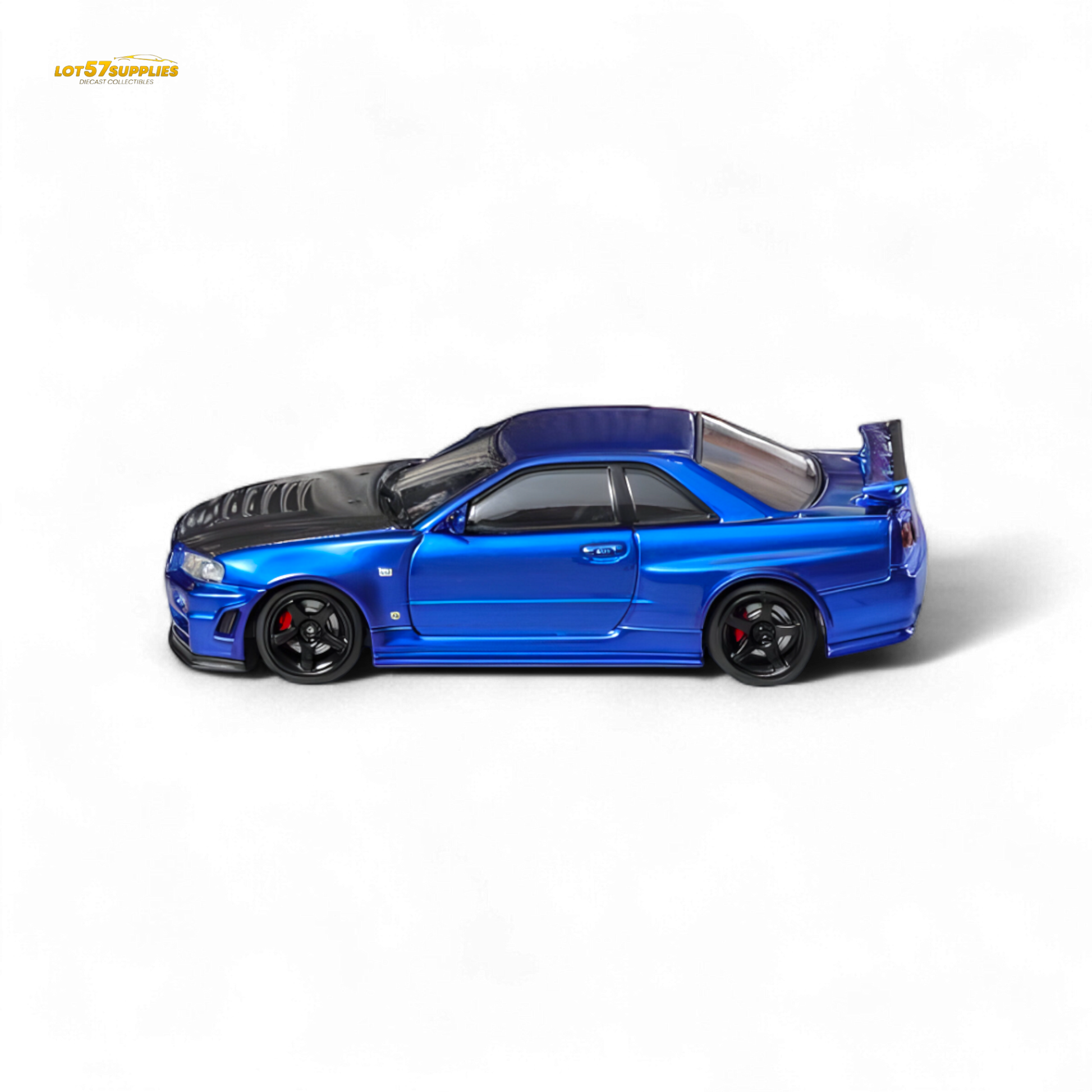 Nissan Fuji Skyline R34 GT-R Nismo Z-Tune diecast model in Bayside Blue, 1:64 scale, featuring detailed exterior and wheels.
