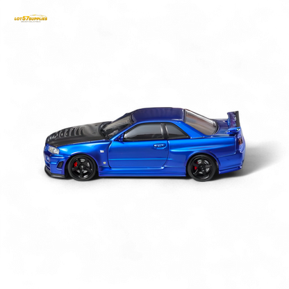 Nissan Fuji Skyline R34 GT-R Nismo Z-Tune diecast model in Bayside Blue, 1:64 scale, featuring detailed exterior and wheels.