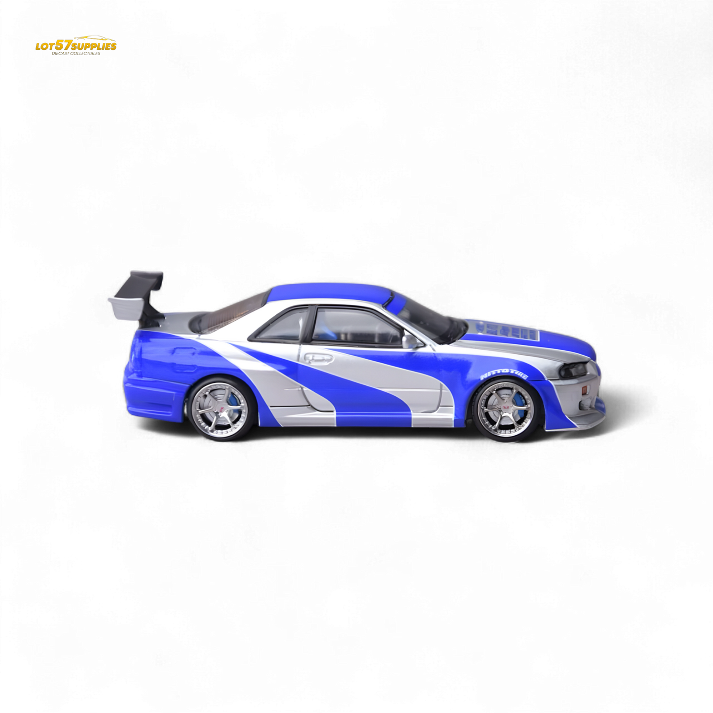 Silver blue Nissan Skyline GT-R R34 diecast model in 1:64 scale by Lot57Supplies, detailed Nissan car collectible.