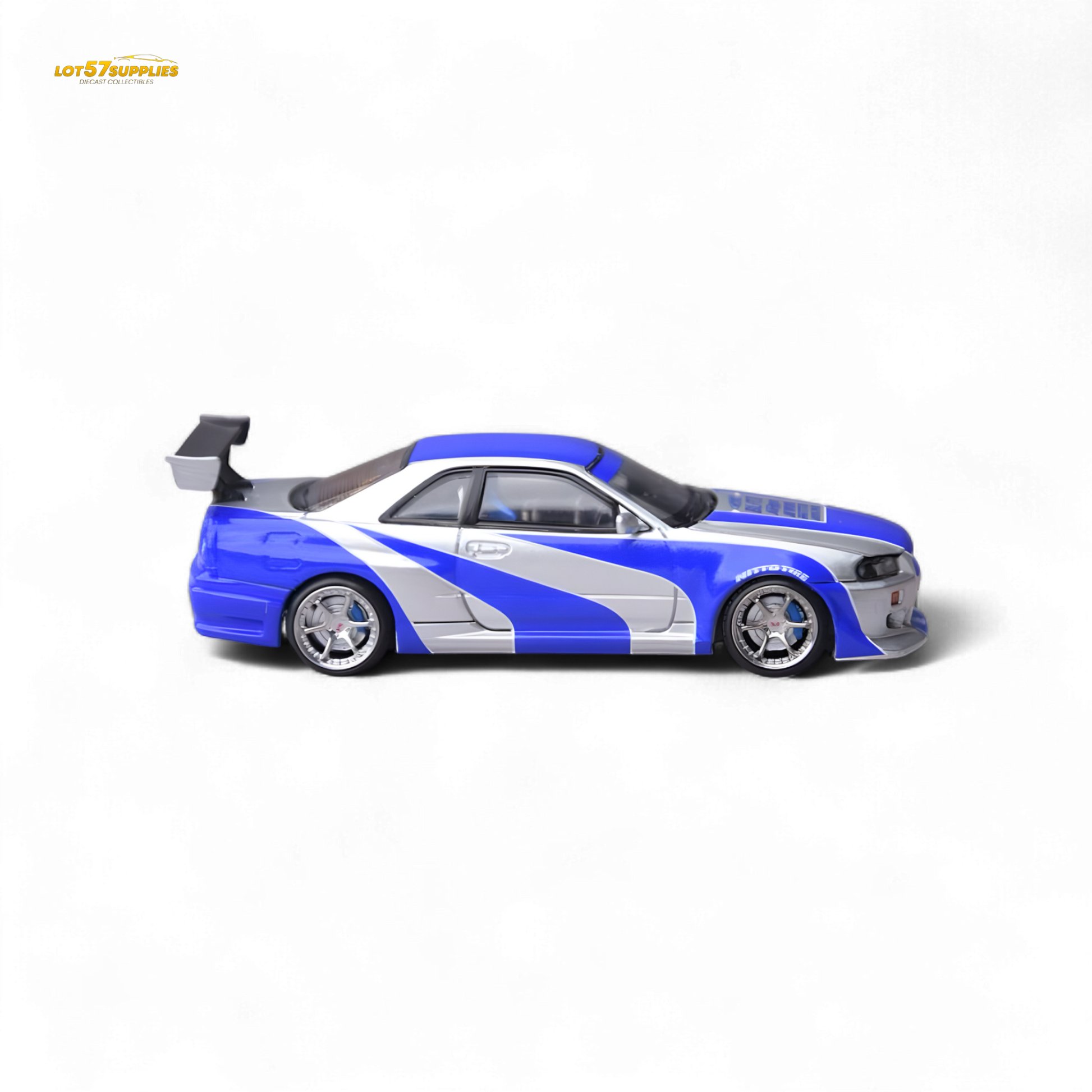 Silver blue Nissan Skyline GT-R R34 diecast model in 1:64 scale by Lot57Supplies, detailed Nissan car collectible.