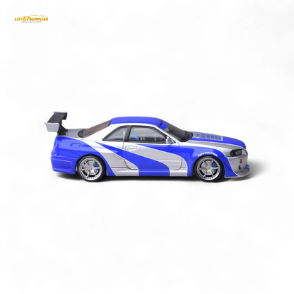 Silver blue Nissan Skyline GT-R R34 diecast model in 1:64 scale by Lot57Supplies, detailed Nissan car collectible.