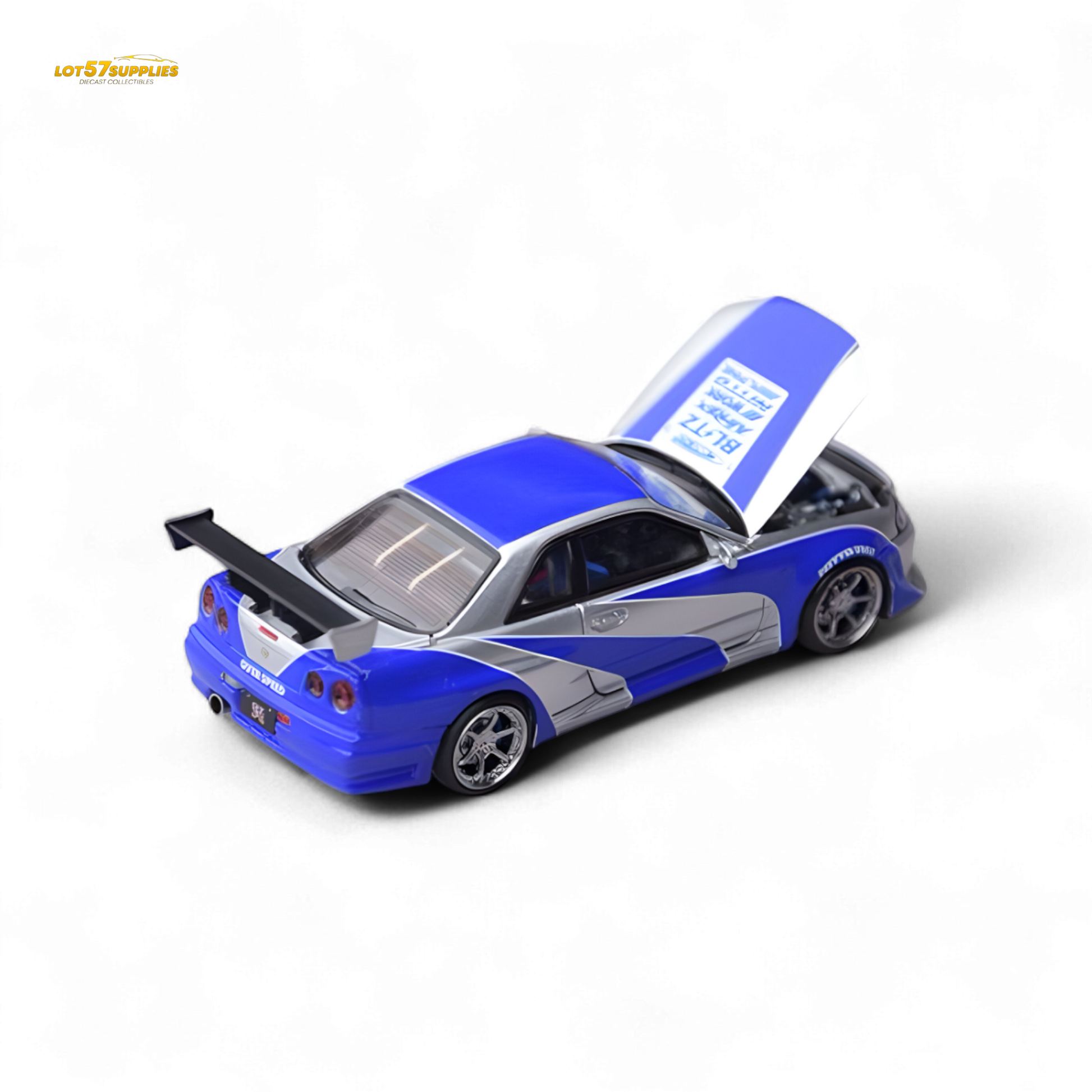 Silver blue Nissan Skyline GT-R R34 diecast car in 1:64 scale, detailed model from Lot57Supplies Diecast Shop.