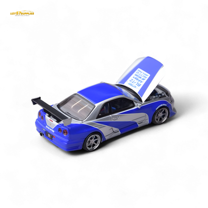 Silver blue Nissan Skyline GT-R R34 diecast car in 1:64 scale, detailed model from Lot57Supplies Diecast Shop.