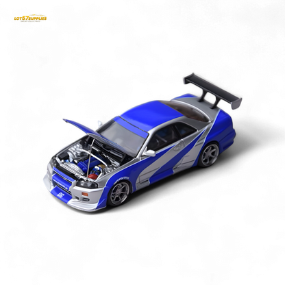 Silver blue Nissan Skyline GT-R R34 diecast model by Lot57Supplies, detailed 1:64 scale car with realistic design.