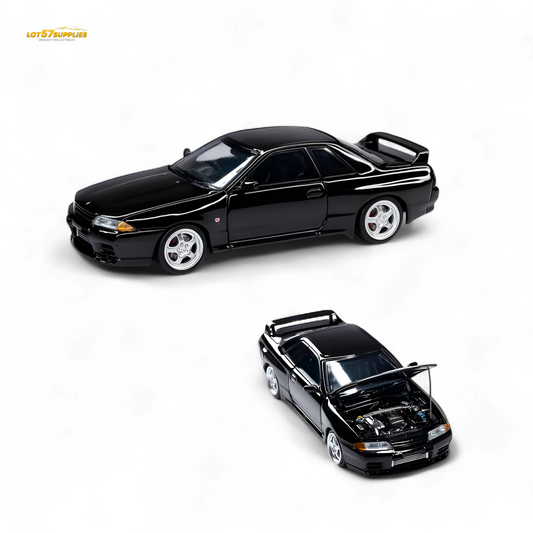 Black Nissan Skyline GT-R R32 Nismo S-Tune diecast model in 1:64 scale, featuring detailed exterior and realistic design.