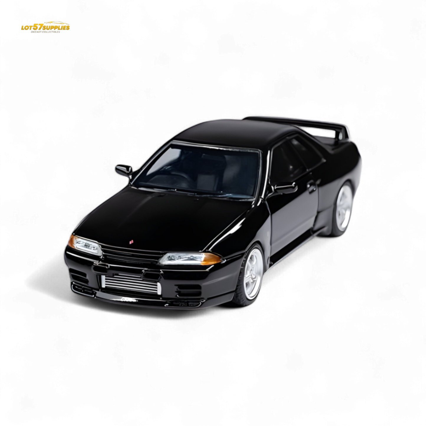 Black Nissan Skyline GT-R R32 Nismo S-Tune diecast model in 1:64 scale, featuring detailed exterior and authentic design.
