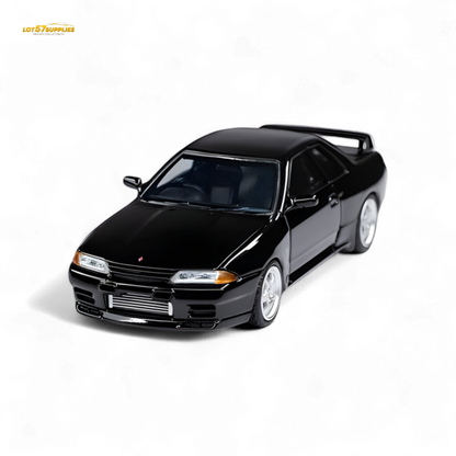 Black Nissan Skyline GT-R R32 Nismo S-Tune diecast model in 1:64 scale, featuring detailed exterior and authentic design.