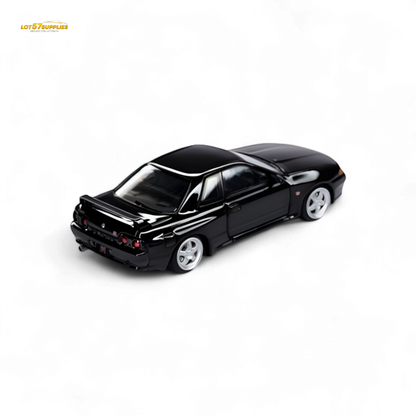 Black Nissan Horizon Skyline GT-R R32 Nismo S-Tune 1:64 diecast model, detailed scale replica with sleek design.
