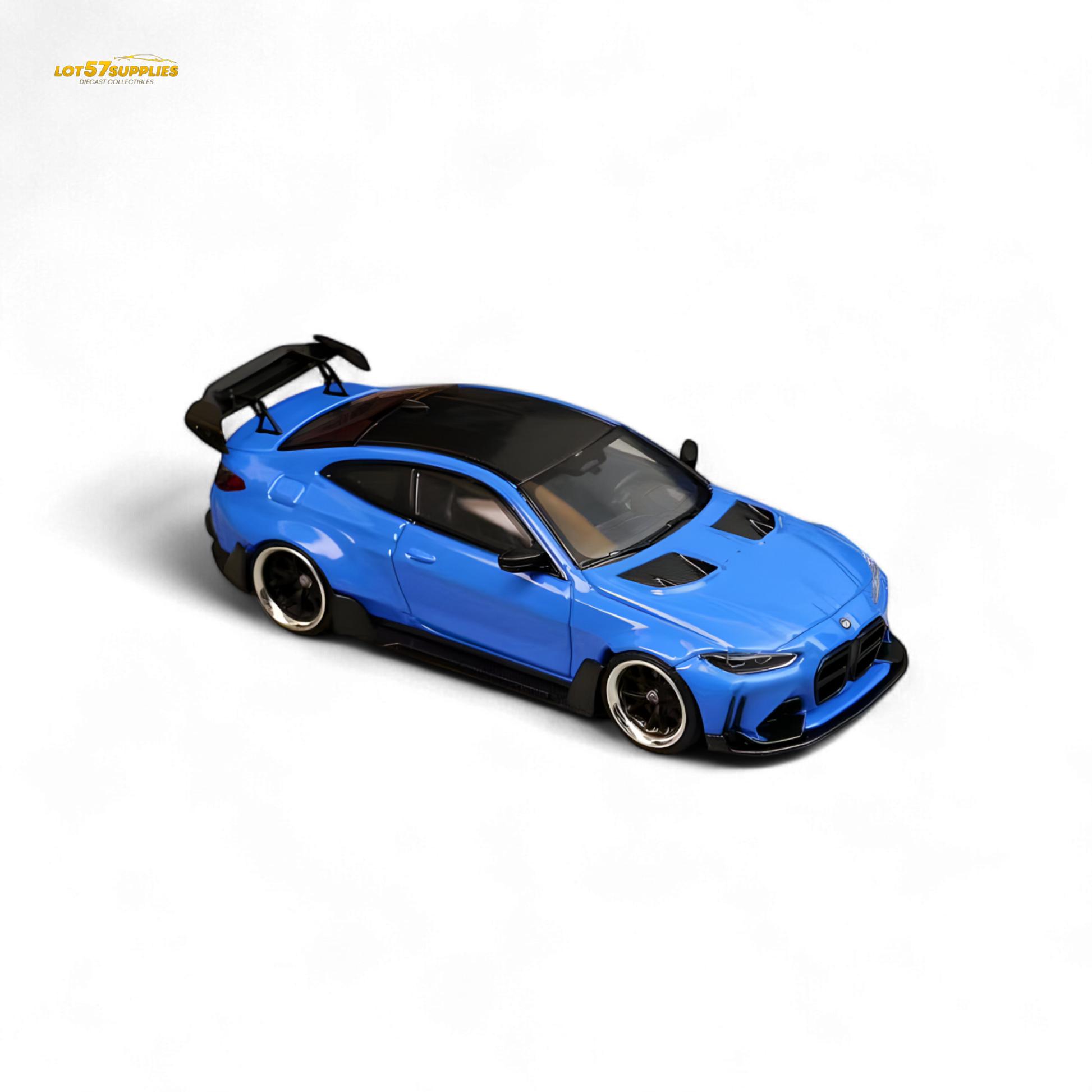 Portimao Blue 1:64 scale SW BMW G82 M4 diecast car with wide-body modifications by Lot57Supplies.