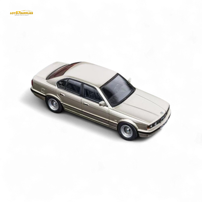 Pre-order DCM BMW E34 5-Series Sedan diecast model in Cashmere Beagle Gold by Lot57Supplies, detailed miniature car.
