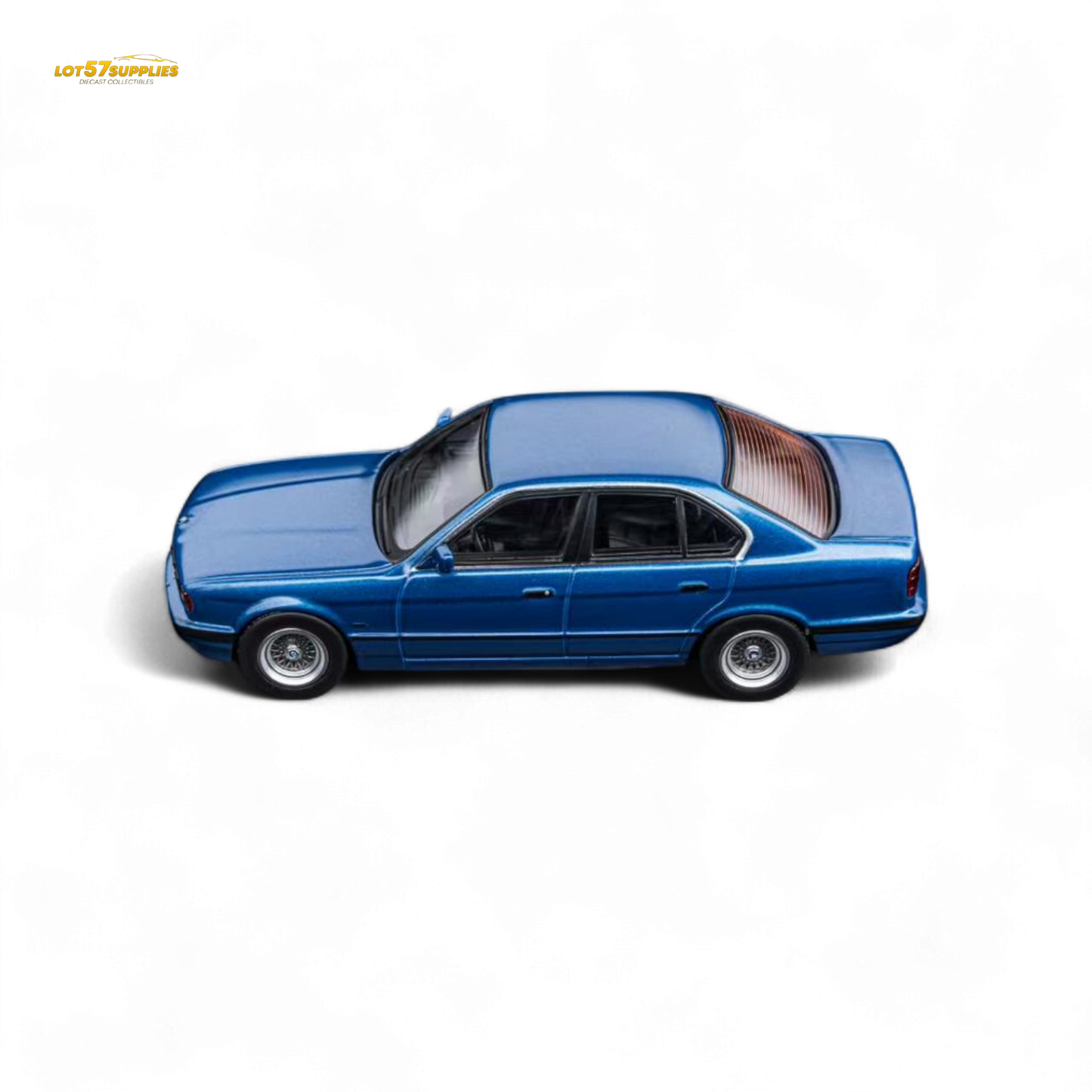 Pre-order DCM BMW E34 5-Series sedan diecast model in Avis Metallic Blue, 1:64 scale, by Lot57Supplies Diecast Shop.