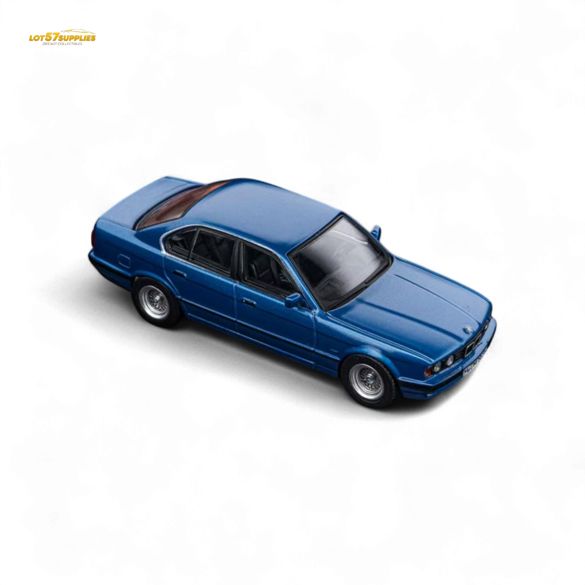 Pre-order diecast BMW E34 5-Series sedan in Avis Metallic Blue, 1:64 scale by Lot57Supplies Diecast Shop.